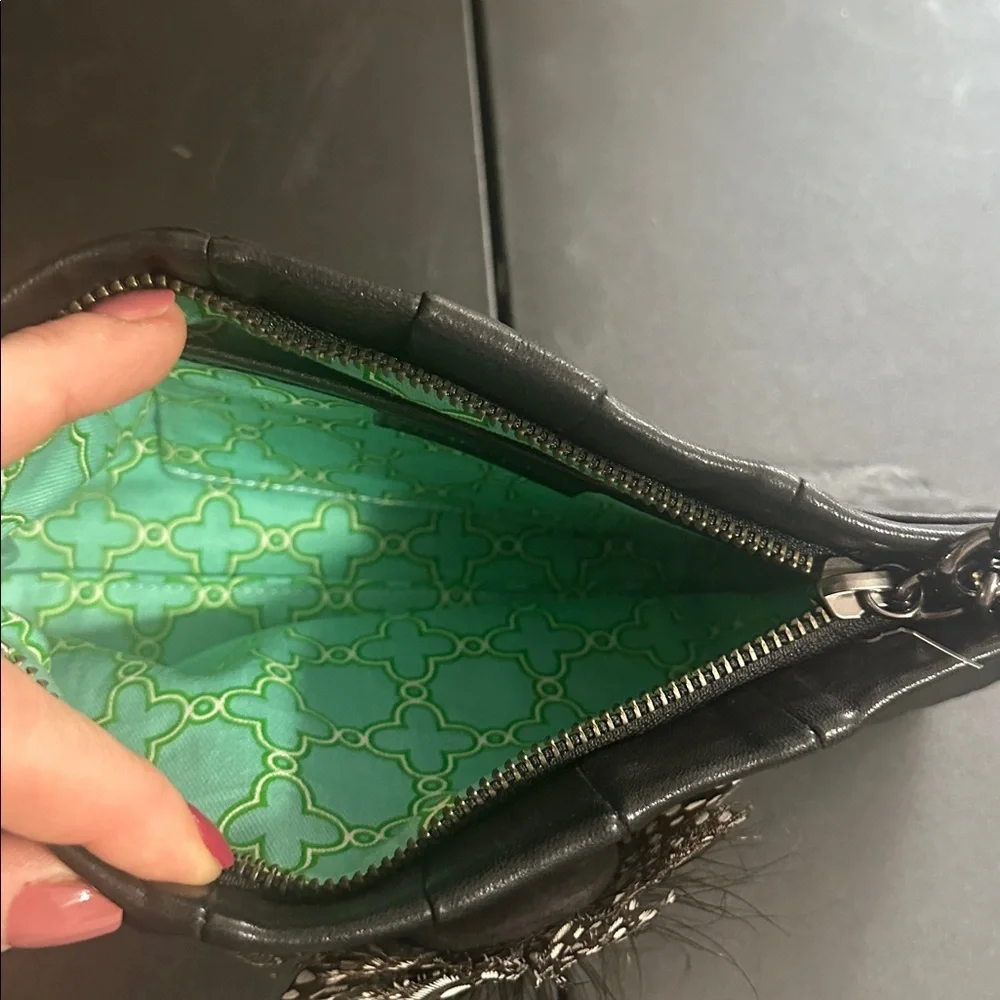 Stella & Dot black leather with feather CZ accent clutch bag
